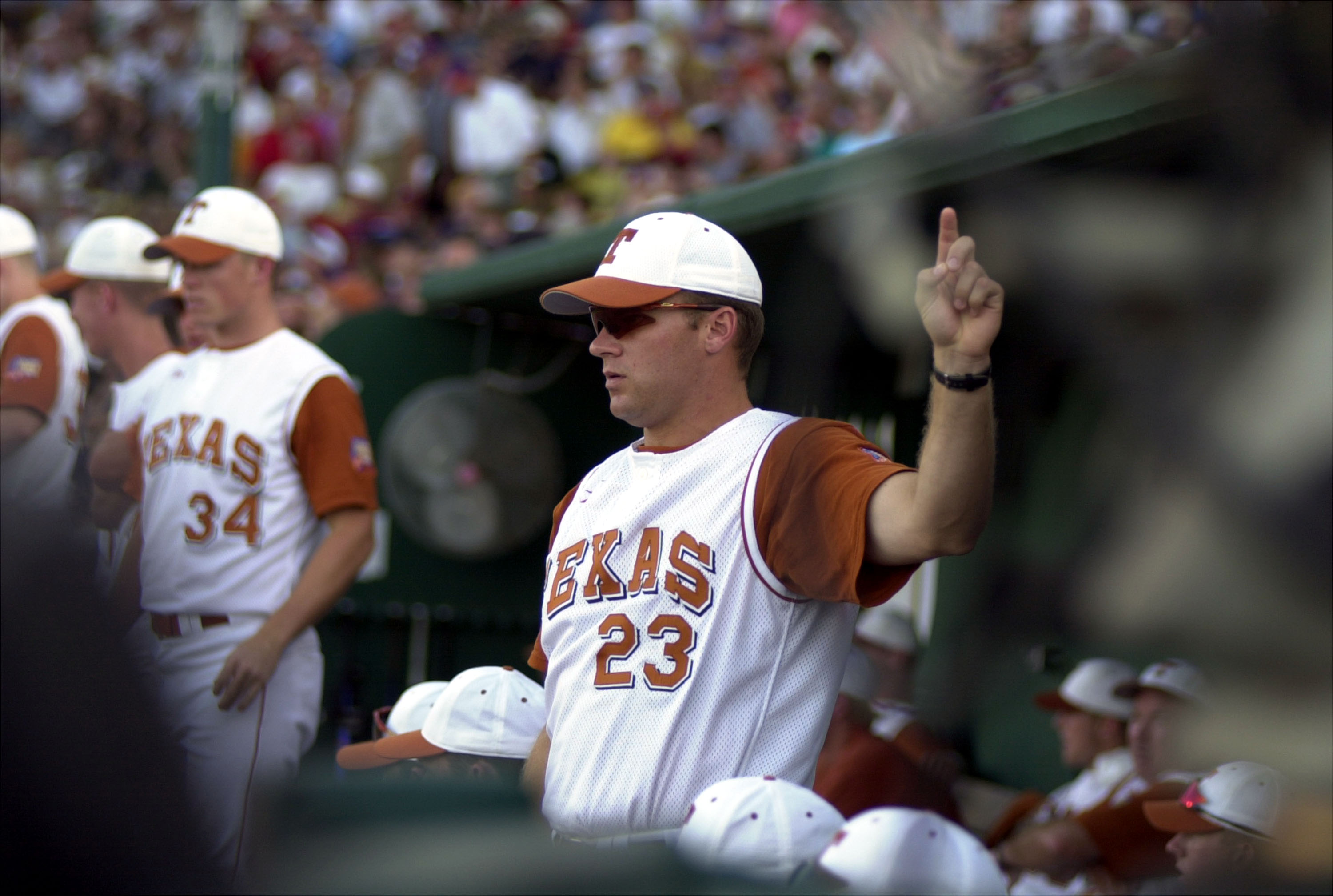 Rob Penders in the Texas dugout at the College World Series